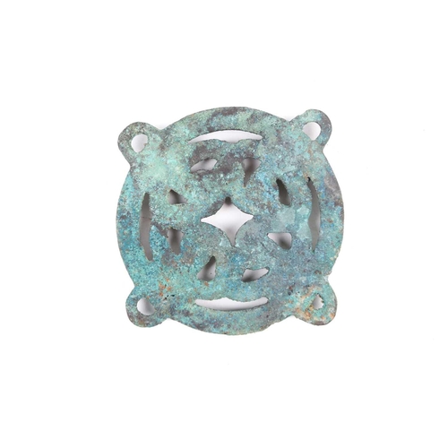 142 - A Warring States style Chinese bronze, possibly from a horse bridle, cast as four entwined dragons w... 