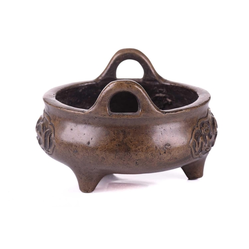 152 - A Chinese bronze censer, possibly 19th century Qing, made for the Islamic market, with loop handles,... 