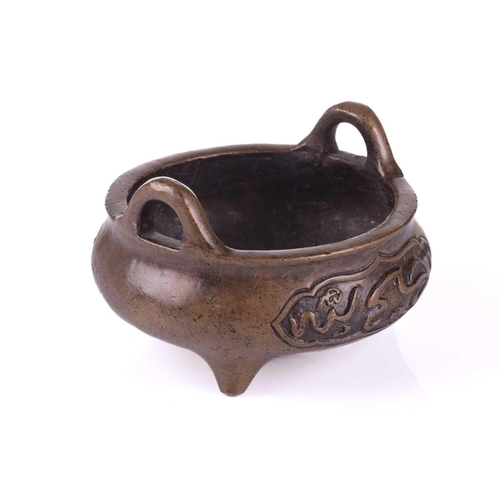 152 - A Chinese bronze censer, possibly 19th century Qing, made for the Islamic market, with loop handles,... 