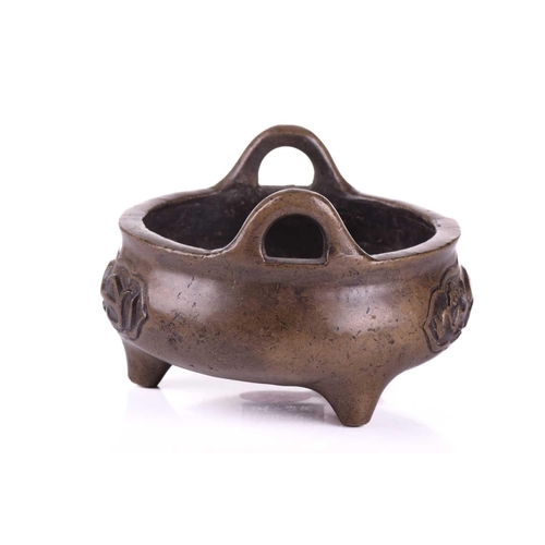 152 - A Chinese bronze censer, possibly 19th century Qing, made for the Islamic market, with loop handles,... 