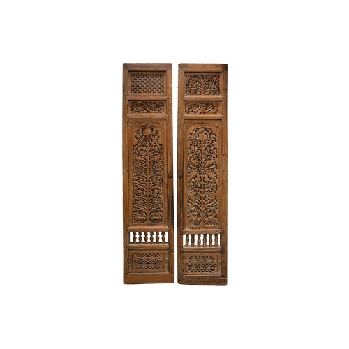 167 - A matched pair of 19th-century teak Haveli screen doors with pierced Arabeques and spindle decoratio... 