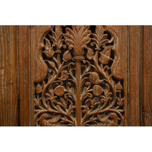 167 - A matched pair of 19th-century teak Haveli screen doors with pierced Arabeques and spindle decoratio... 