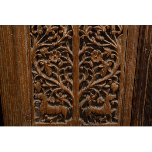 167 - A matched pair of 19th-century teak Haveli screen doors with pierced Arabeques and spindle decoratio... 