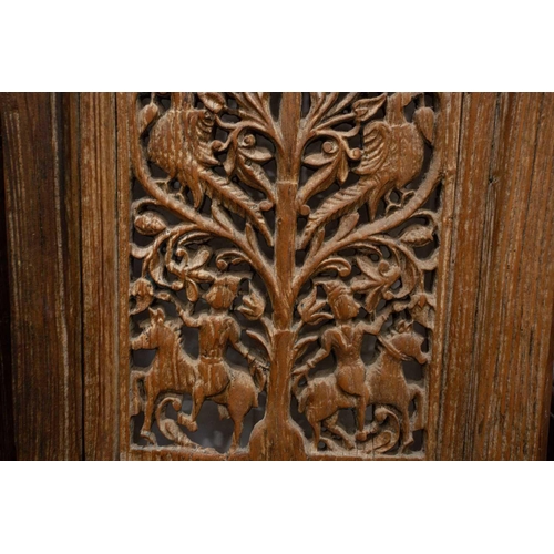 167 - A matched pair of 19th-century teak Haveli screen doors with pierced Arabeques and spindle decoratio... 