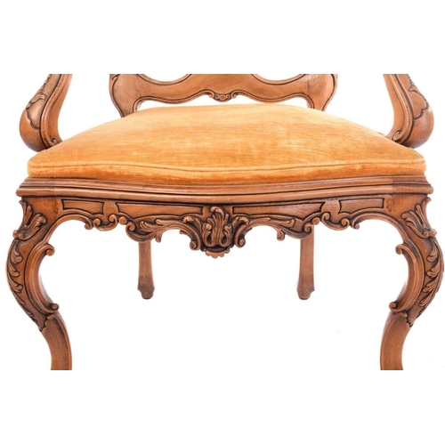 186 - An 18th-century Venetian style carved walnut open armchair, 20th century with shaped spoon back and ... 