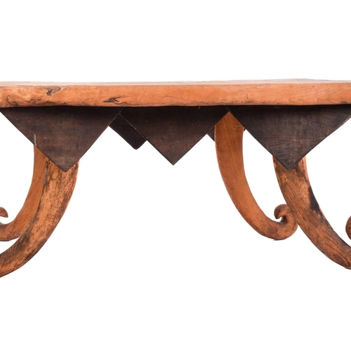 191 - A unique 20th-century artisanal rustic hewn elm serving table, with a shaped top, fitted three raise... 