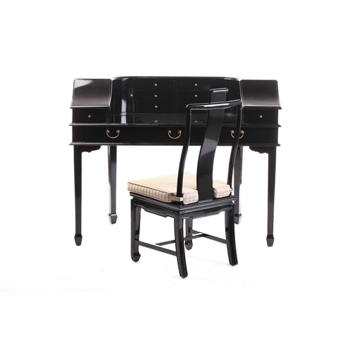 197 - A black lacquered Carlton House-type writing desk, 20th century, fitted with a bank of short drawers... 