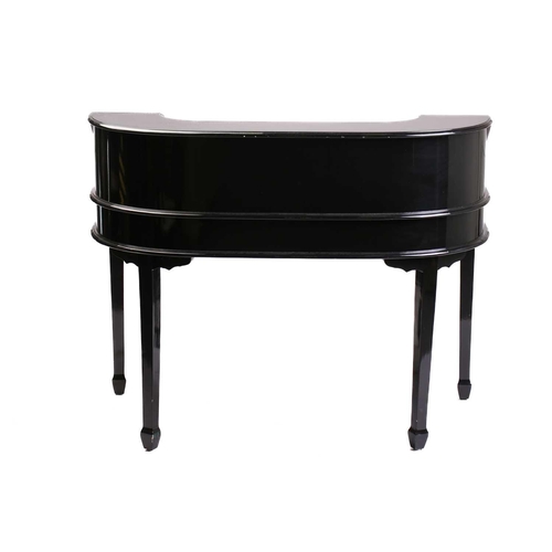 197 - A black lacquered Carlton House-type writing desk, 20th century, fitted with a bank of short drawers... 