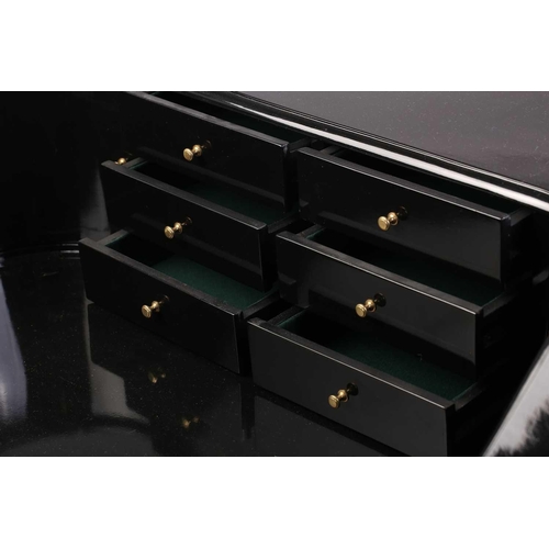 197 - A black lacquered Carlton House-type writing desk, 20th century, fitted with a bank of short drawers... 