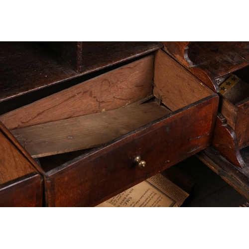 200 - A country-made 18th-century walnut fall front writing bureau, with 