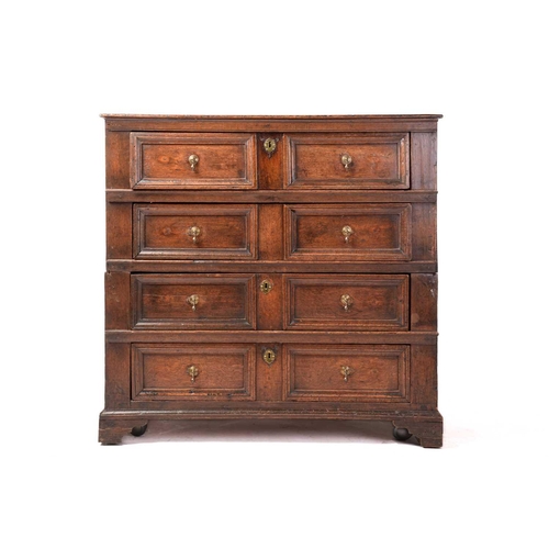 204 - A Charles II oak two-section chest of four drawers with simple moulded drawer fronts and panel const... 