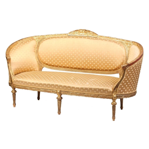 206 - A Louis XVI style carved and giltwood three-seat canape/ sofa, 20th century, with rose-carved cresti... 