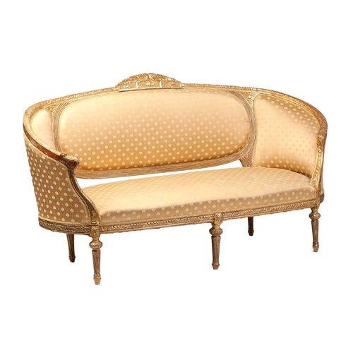 206 - A Louis XVI style carved and giltwood three-seat canape/ sofa, 20th century, with rose-carved cresti... 