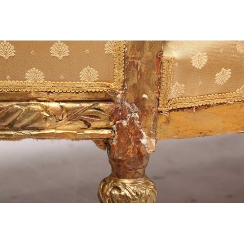 206 - A Louis XVI style carved and giltwood three-seat canape/ sofa, 20th century, with rose-carved cresti... 