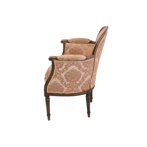 207 - A 'French Hepplewhite' style bergere armchair, early/mid 20th century, with painted channelled frame... 