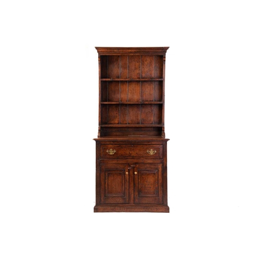 208 - A craftsman-made George III-style oak dresser and rack of small proportions, 20th century, the base ... 