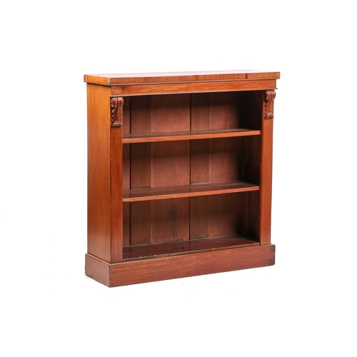 218 - A late Victorian mahogany open bookcase with carved corbels and a simple plinth base. 117 cm wide x ... 