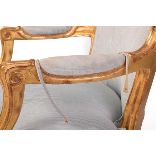 222 - A pair of French Louis XV-style carved wood and gilt gesso fauteuils, 20th century with serpentine c... 