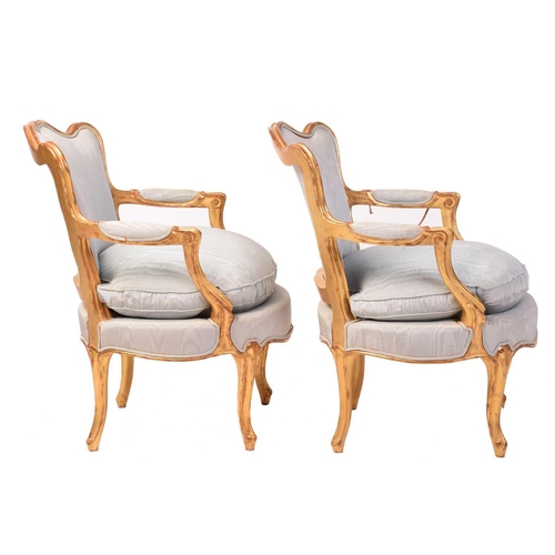 222 - A pair of French Louis XV-style carved wood and gilt gesso fauteuils, 20th century with serpentine c... 