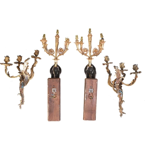 223 - A pair of French ormolu rococo three-sconce wall lights with punch matted detail, each stamped CE, 3... 