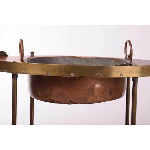 225 - An 'Army & Navy' style oval teakwood three-tier washstand, late 19th century with brass galleries an... 