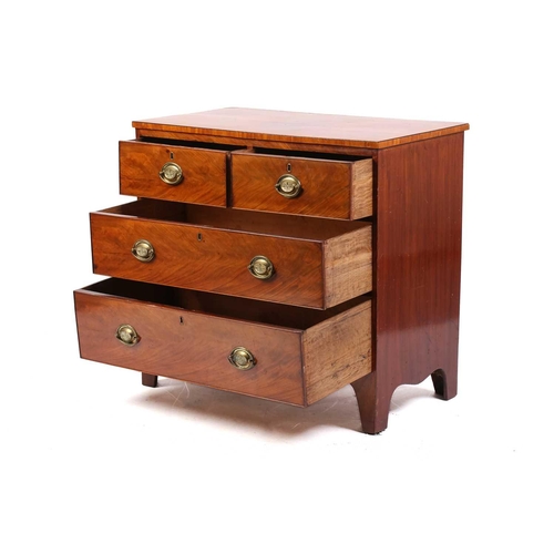 227 - An early 19th-century small mahogany chest of two short over two long drawers, with satinwood crossb... 