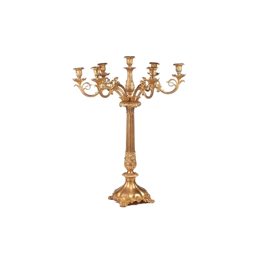 229 - A pair of large, impressive gilt metal table candelabrum with seven removable convolvulus vine branc... 