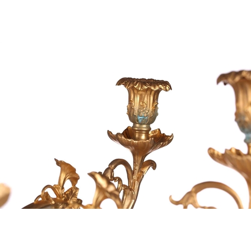 229 - A pair of large, impressive gilt metal table candelabrum with seven removable convolvulus vine branc... 