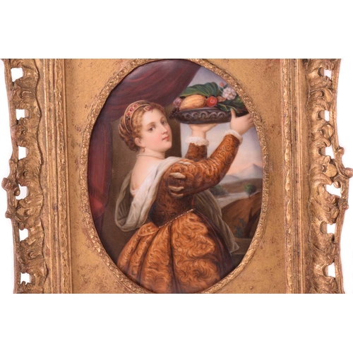 83 - A late 19th century framed oval porcelain plaque, probably KPM, painted after Titian, 'Girl with a B... 