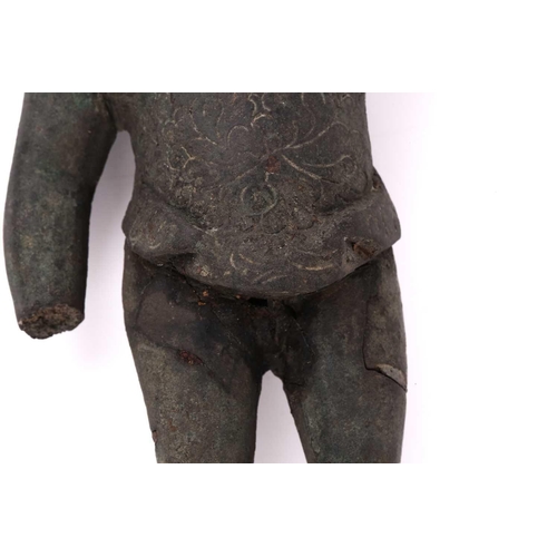 300 - A Chinese green-patinated bronze figure of a standing infant Buddha, Ming Dynasty 15th/16th century ... 