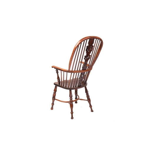 312 - A 19th century Nottinghamshire yew wood and ash high back Windsor chair, with shaped and pierced bac... 