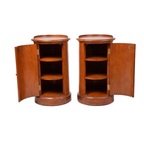 315 - A pair of Victorian style mahogany cylinder pot cupboards, 20th century, with part blind gallery top... 