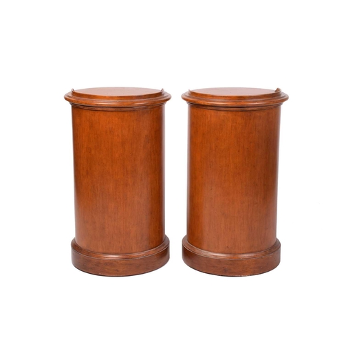 315 - A pair of Victorian style mahogany cylinder pot cupboards, 20th century, with part blind gallery top... 