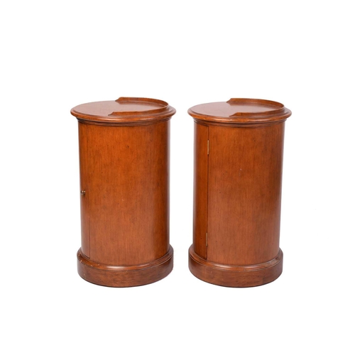 315 - A pair of Victorian style mahogany cylinder pot cupboards, 20th century, with part blind gallery top... 