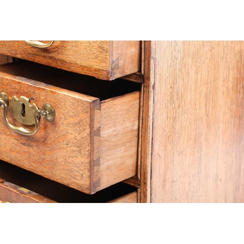 319 - An 18th-century oak kneehole writing desk fitted with a central frieze drawer above a further six sh... 