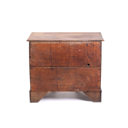 319 - An 18th-century oak kneehole writing desk fitted with a central frieze drawer above a further six sh... 