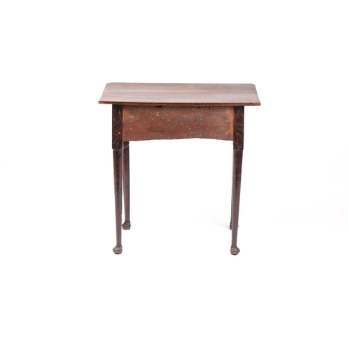 325 - An early 18th-century oak three-drawer side table with turned legs terminating in pad feet. 67 cm wi... 