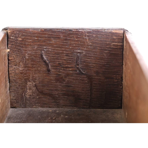 325 - An early 18th-century oak three-drawer side table with turned legs terminating in pad feet. 67 cm wi... 