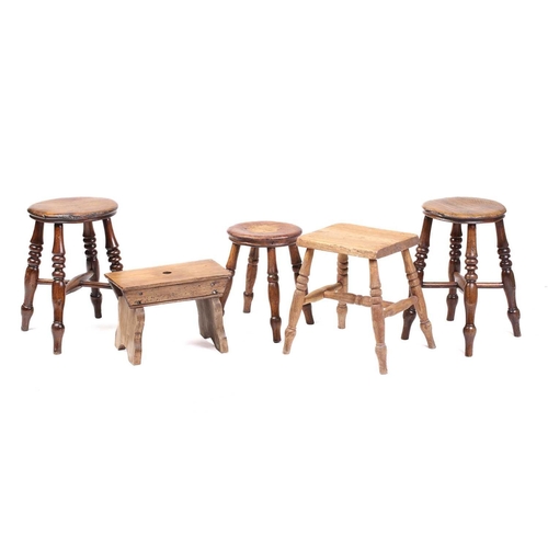 326 - A collection of turned ash and elm stools and also a boarded stool. (5)