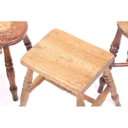 326 - A collection of turned ash and elm stools and also a boarded stool. (5)