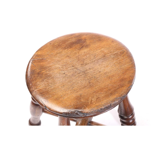 326 - A collection of turned ash and elm stools and also a boarded stool. (5)