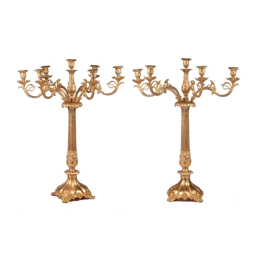 333 - A pair of large, impressive gilt metal table candelabrum with seven removable convolvulus vine branc... 