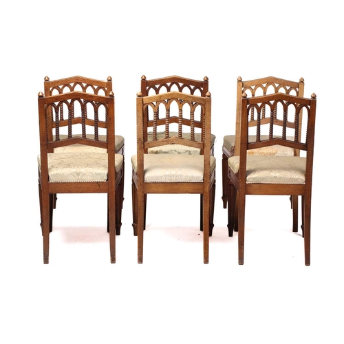 347 - A set of six William IV oak Gothic revival side chairs possibly by Gillows of Lancaster the shallow ... 