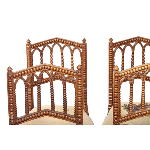 347 - A set of six William IV oak Gothic revival side chairs possibly by Gillows of Lancaster the shallow ... 