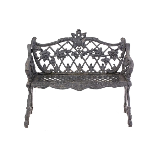 355 - A large heavy cast iron two-seat garden bench, 20th century.