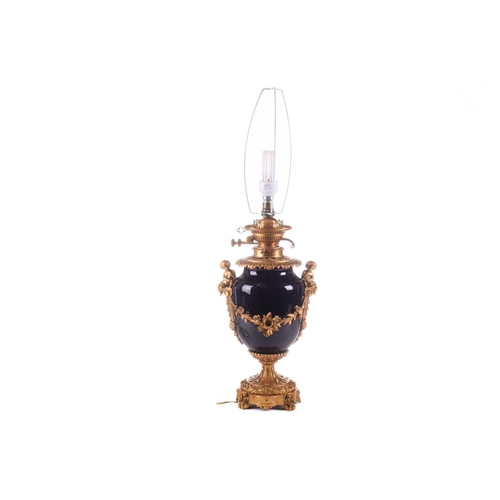 363 - A large French ormolu and cobalt-blue ceramic table lamp, originally converted from an oil lamp, wit... 