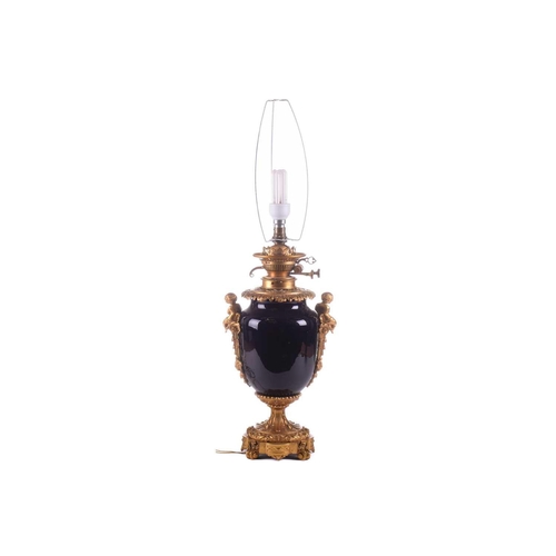 363 - A large French ormolu and cobalt-blue ceramic table lamp, originally converted from an oil lamp, wit... 