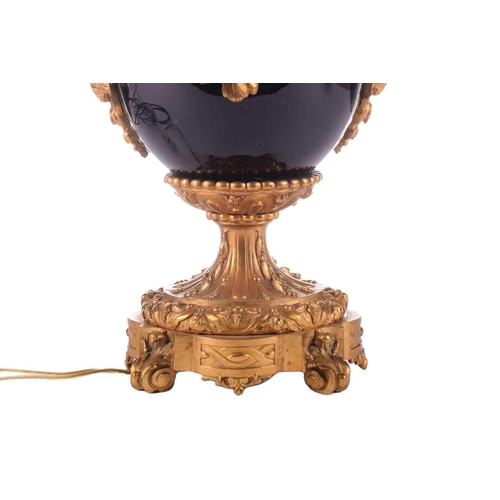 363 - A large French ormolu and cobalt-blue ceramic table lamp, originally converted from an oil lamp, wit... 