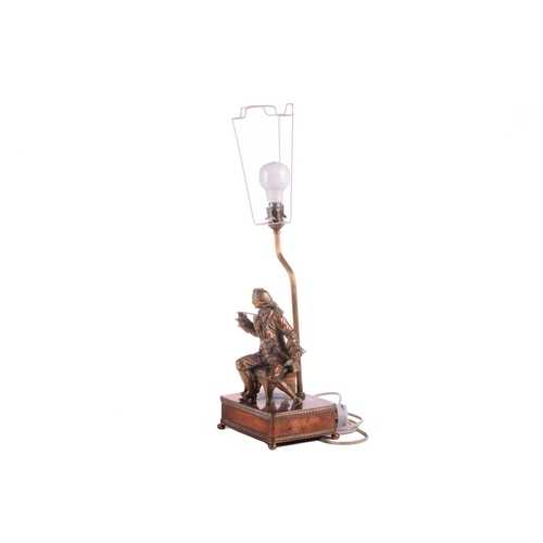 364 - A 20th-century copper and gilt brass figural table lamp, modelled a seated dandy, 68 cm high to incl... 