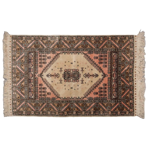 368 - A faded ivory ground Qum silk on silk rug, 20th century, with a central medallion and corners, 184 c... 